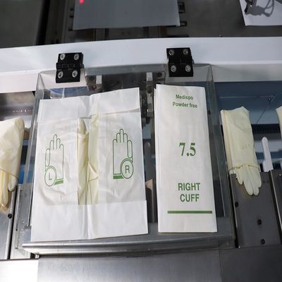Maschine zum Umpacken von chirurgischen Handschuhen mit Servoantrieb für Portemonnaiepackungen